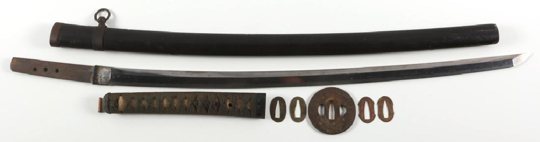 JAPANESE WAKIZASHI: JAPANESE WAKIZASHI A wakizashi, unsigned. Silk bound shagreen hilt, metal floral menuki, and iron circular tsuba with gold color floral patterns. Silver habaki with falling rain pattern. Black lacquer