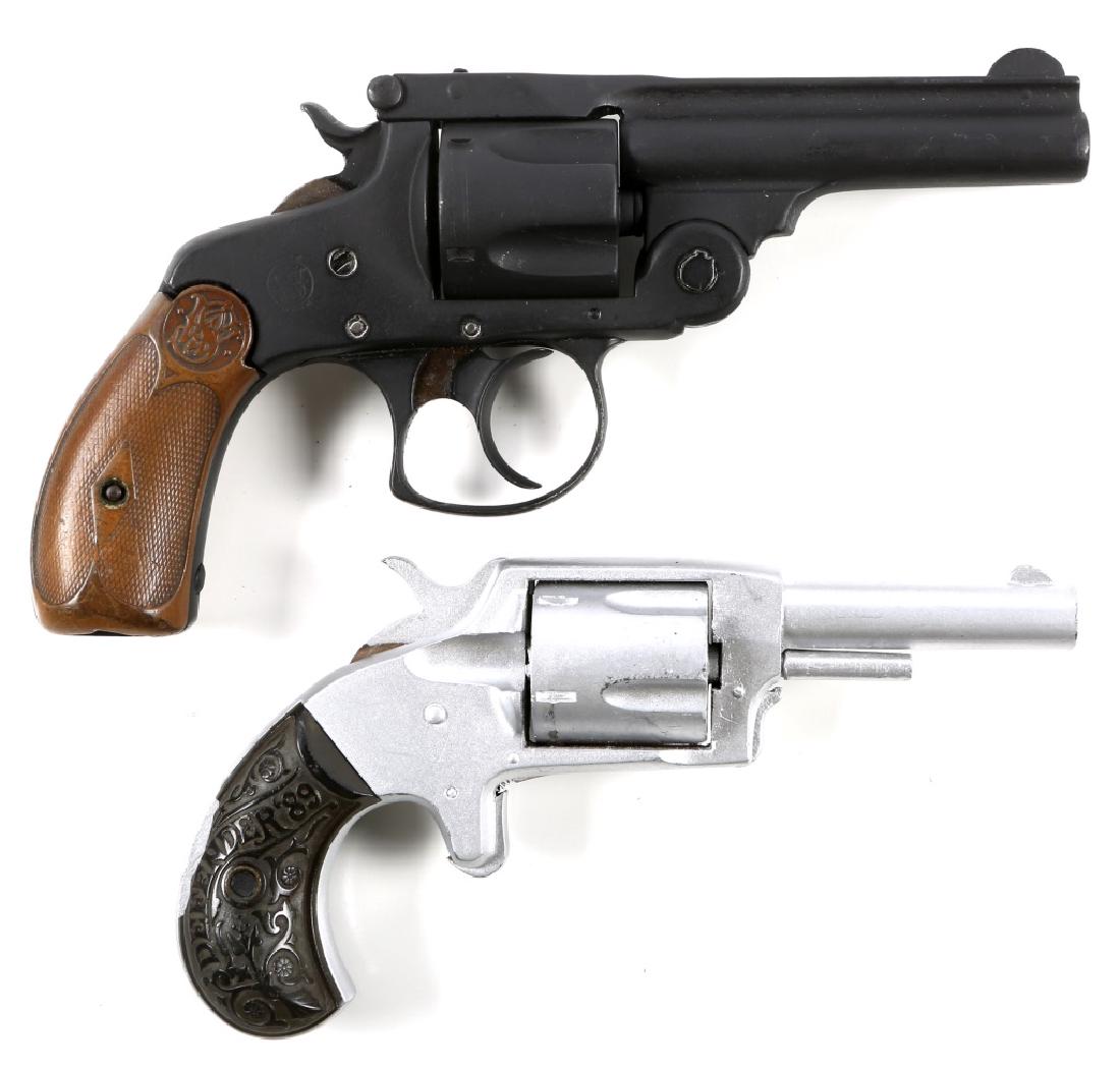 TWO ANTIQUE REVOLVERS SMITH & WESSON AND DEFENDER: TWO ANTIQUE REVOLVERS SMITH & WESSON AND DEFENDER Two antique revolvers. Smith & Wesson and Defender. Serial Number: NSN