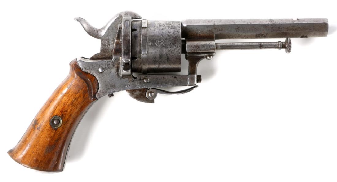 BELGIAN 30 CAL SMALL FRAME PINEFIRE REVOLVER: BELGIAN 30 CAL SMALL FRAME PINEFIRE REVOLVER 28 stamped on barrel and frame. ELG over star on cylinder. Star over M on barrel and cylinder. Octagon barrel. 7.5" overall. Caliber / Gauge: .30 Barrel Le