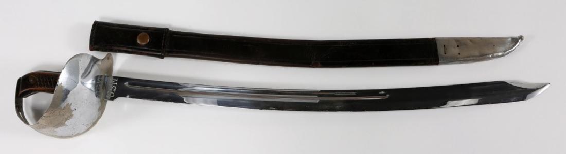 WWI US NAVY M1917 CUTLASS SWORD WITH SCABBARD: WWI US NAVY M1917 CUTLASS SWORD WITH SCABBARD Blade Length: 25" Overall Length: 30"