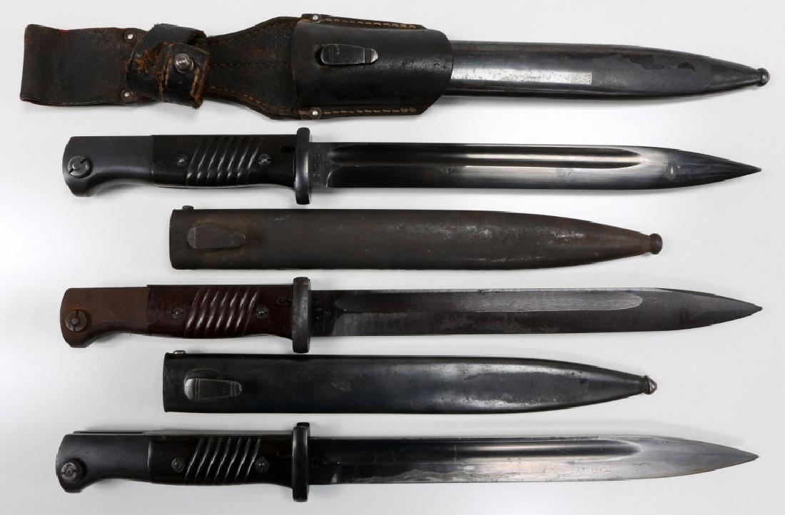 WWII GERMAN MAUSER K98 COMBAT BAYONET LOT OF 3: WWII GERMAN MAUSER K98 COMBAT BAYONET LOT OF 3 Bakelite handles. Blade stamped "Berg & Co", scabbard "Durkopp 38", mismatch numbers, leather frog. Blade & scabbard stamped "Cof 44", matching numbers. 
