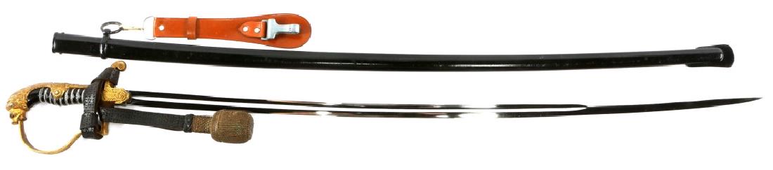 WWII GERMAN OFFICER LION HEAD DRESS SWORD EICKHORN: WWII GERMAN OFFICER LION HEAD DRESS SWORD EICKHORN WWII German Army officer lion head dress sword by Eickhorn. Blade and scabbard in mint condition. Some patina on the guard. Leather hanger. Portepee 
