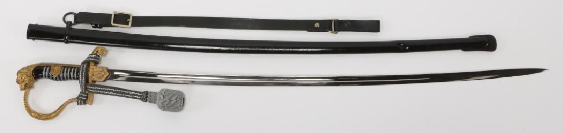 WWII GERMAN PERSONALIZED ARMY LION HEAD SWORD: WWII GERMAN PERSONALIZED ARMY LION HEAD SWORD WWII German Personalized Lion head Army sword with leather hanger and portepee. Mfg by Carl Eickhorn. Solingen. Custom engraving with the initials " H. R 