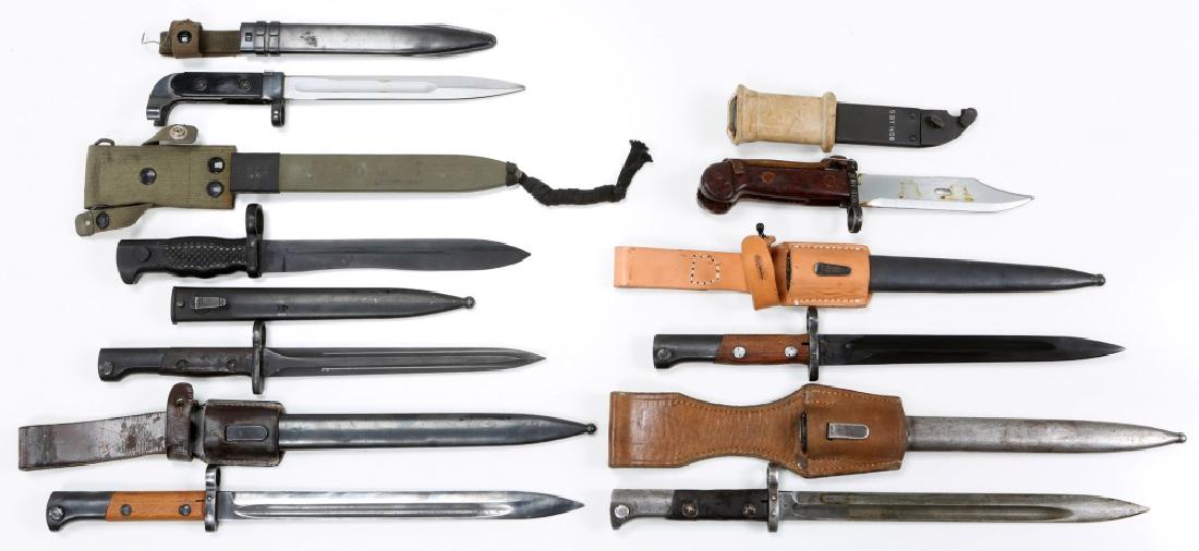 WORLD MILITARY BAYONET MIXED LOT OF 7: WORLD MILITARY BAYONET MIXED LOT OF 7 Two Czech V23 bayonets with scabbards and leather frogs, blade size 11.5", overall size 16.75". Yugoslavian M1924 bayonet with leather frog (repro), blade size 9.