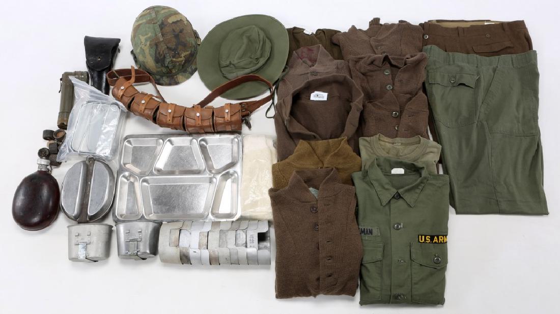 BONANZA LOT OF MILITARY COLLECTIBLES: BONANZA LOT OF MILITARY COLLECTIBLES Early 80's US M1 combat helmet with camo cover. OD green boonie hat. Eight military wool brown sweaters. Set of OG-107 sateen Army shirt and pants, green T-shirt. 