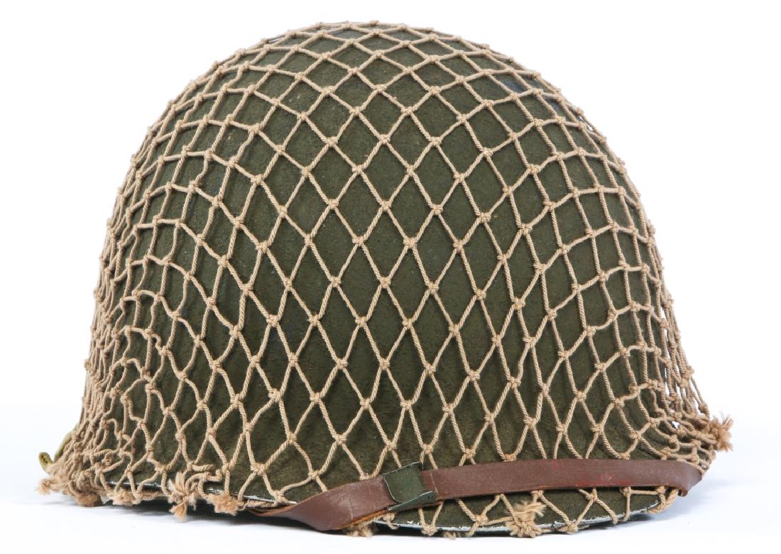 WWII US ARMY FIXED BALE M1 COMBAT HELMET: WWII US ARMY FIXED BALE M1 COMBAT HELMET Front seam, fixed bale, Seaman liner.