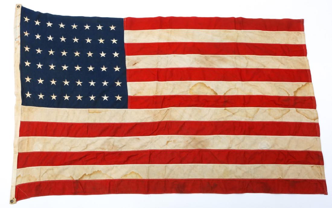 PERIOD AMERICAN FLAG 48 STARS: PERIOD AMERICAN FLAG 48 STARS Multiple pieces construction. Cotton embroidered stars. Size: 36" x 60"