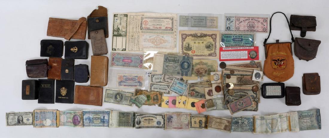 WWII WALLETS AND WORLD CURRENCY: WWII WALLETS AND WORLD CURRENCY 18 Wallets and small pouches. An Assortment of World Currency from the WWII era. Size: 3" - 7.5"