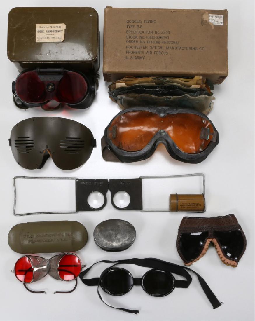 WWII US EYEWEAR LOT OF 8: WWII US EYEWEAR LOT OF 8 1 Red Lenses, Tracer Observing Glasses, 1 Type B-8 Flying Goggles, 1 USN Abrams Instrument stand-alone magnifying lenses, 1 Swiss tinted Goggles in can, 1 US Variable Density 