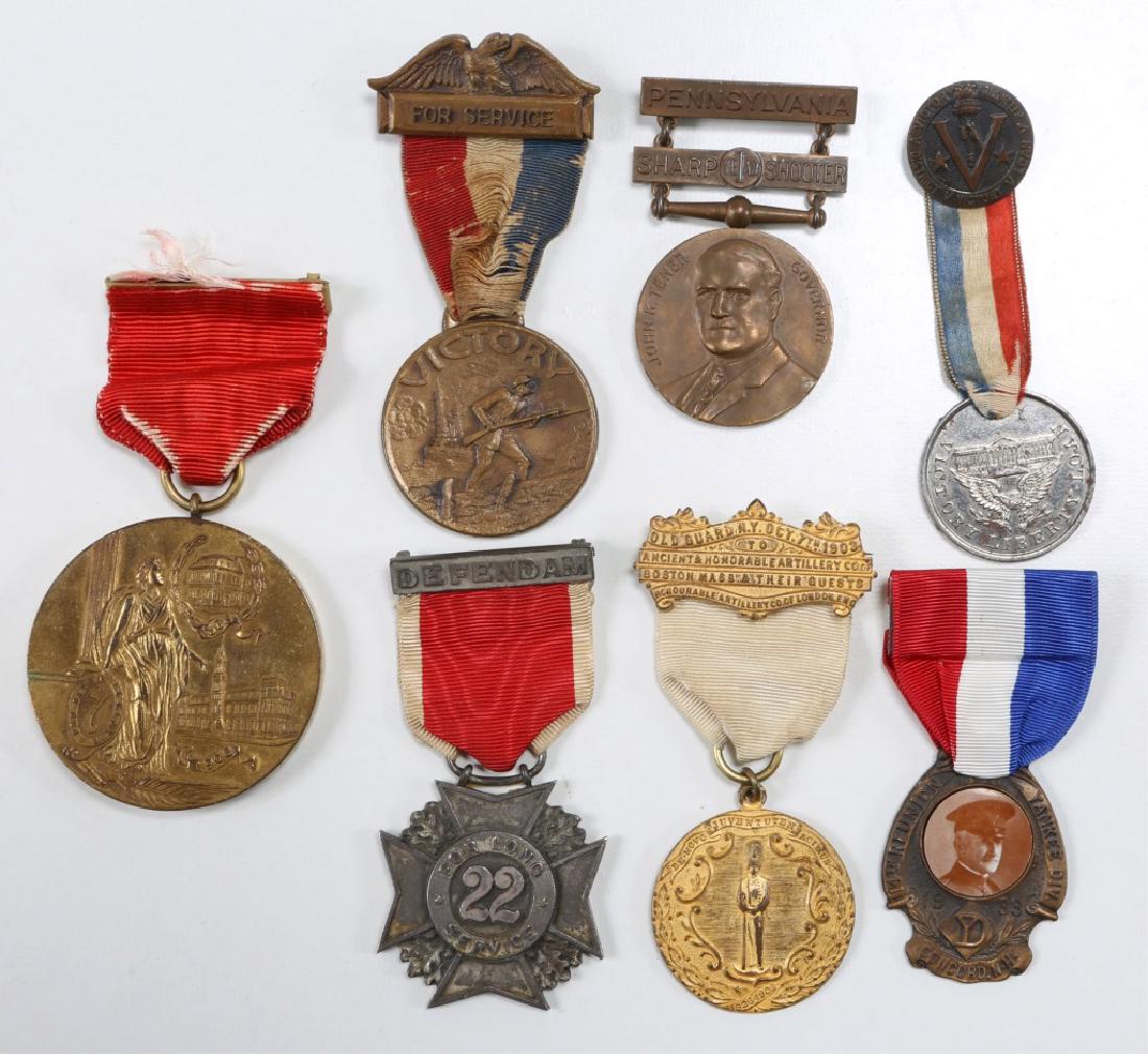 US ARMY NATIONAL GUARD MEDAL MIXED LOT OF 7: US ARMY NATIONAL GUARD MEDAL MIXED LOT OF 7 N.Y 7th Regiment NG table top medal by BB&B. WWI service Victory medal by the Boston postal service. 22 years long service medal named. 1903 Old Guard of N.