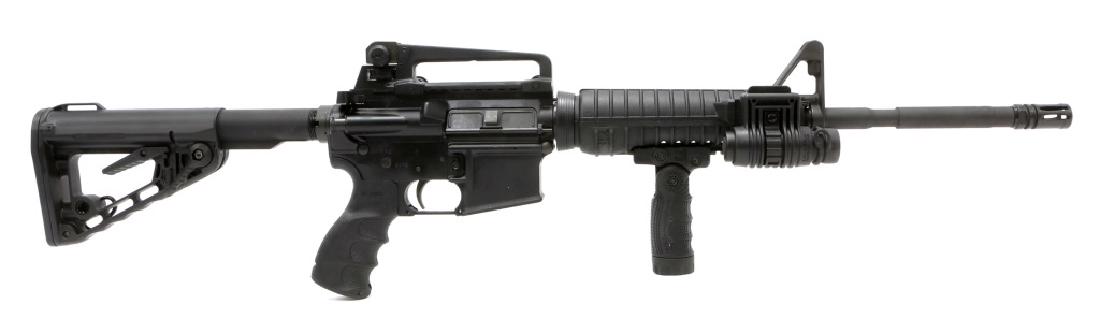 COLT M4 5.56mm CARBINE: COLT M4 5.56mm CARBINE FAB Defense: forestock, front and rear grip, and speedlight. Model: M4 Carbine Caliber / Gauge: 5.56mm Barrel Length: 18" Serial Number: LE128663