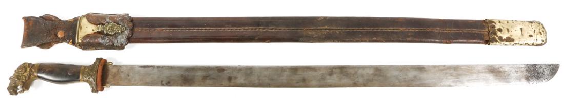 SPANISH AMERICAN WAR ERA SOLINGEN MACHETE SWORD: SPANISH AMERICAN WAR ERA SOLINGEN MACHETE SWORD Spanish American War era machete sword. Weyersberg Hermanos Solingen Germany stamped on blade. Decorative cat fighting a snake on pommel. Blade Length: