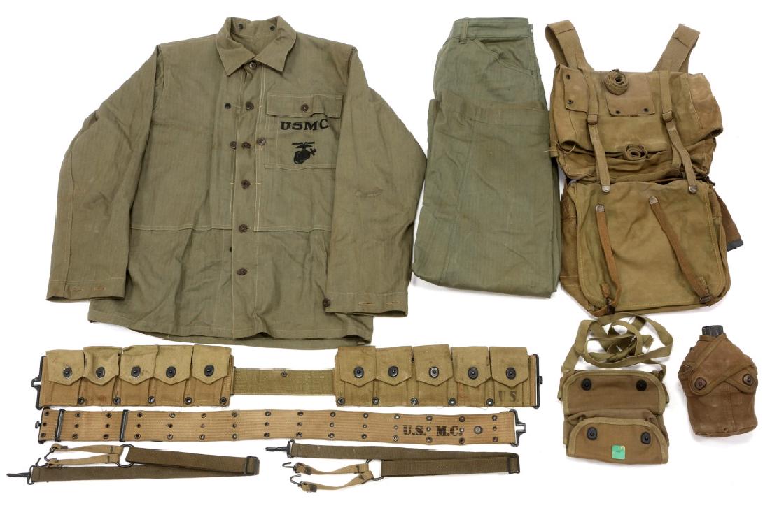 WWII USMC P44 HBT UNIFORM & COMBAT FIELD GEAR LOT: WWII USMC P44 HBT UNIFORM & COMBAT FIELD GEAR LOT WWII US Marine Corps P44 HBT combat tunic & P41 HBT combat trousers set. M41 haversack upper and lower, pistol belt, canteen, cartridge belt, 3 pocket