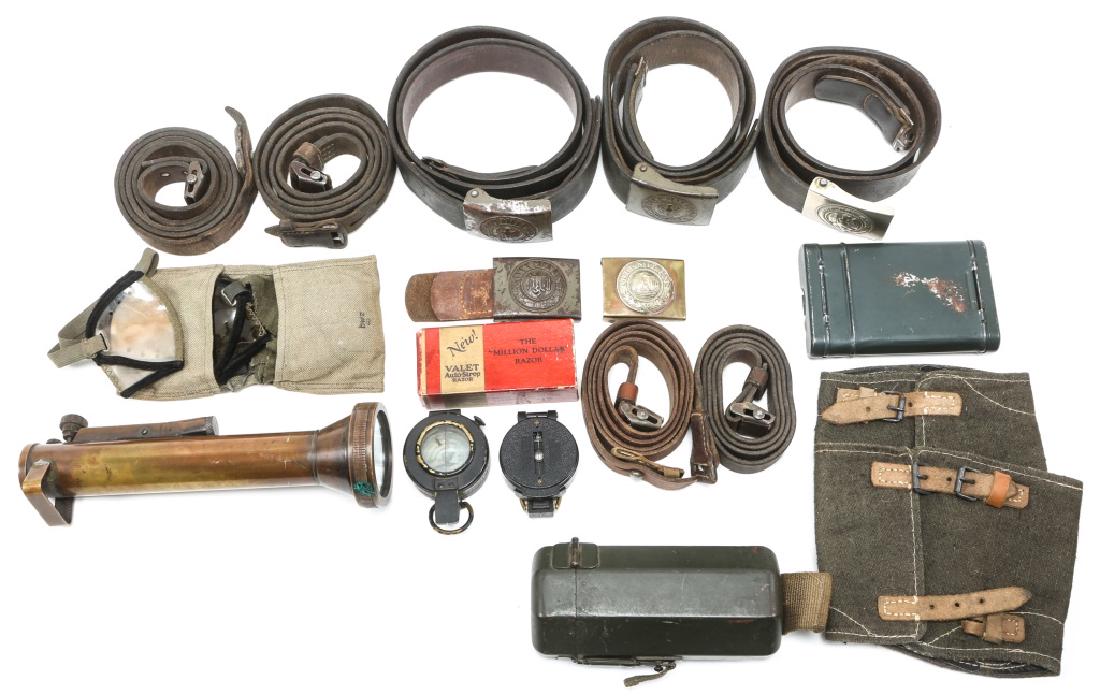 GERMAN MILITARY FIELD GEAR BELTS, SCOPE CASE LOT: GERMAN MILITARY FIELD GEAR BELTS, SCOPE CASE LOT Lot of German Military field gear. Includes belts, gun cleaner kit, scope case, British MK III 42 prismatic compass. Shaving kit in original box. Germa
