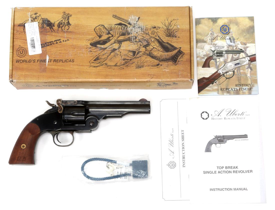 UBERTI NO. 1 SCHOFIELD 1875 TOP BREAK REVOLVER: UBERTI NO. 1 SCHOFIELD 1875 TOP BREAK REVOLVER Original box and papers. Model: No. 1 1875 Caliber / Gauge: .45 Colt Barrel Length: 5" Serial Number: F14308