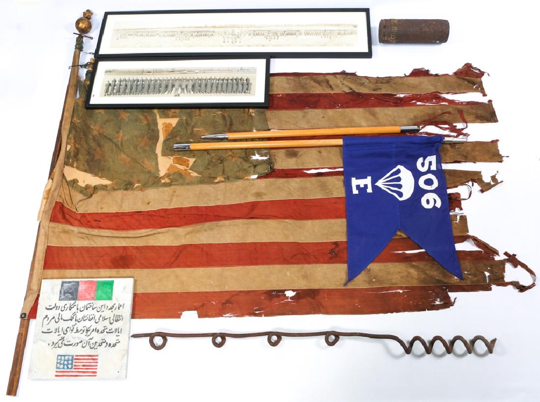 US MILITARY FLAG, PHOTO AND PLAQUE LOT: US MILITARY FLAG, PHOTO AND PLAQUE LOT 1- Early American flag with pole and eagle on ball topper. 1- Modern E Company, 506th Infantry Regiment flag on pole. 1- Afghanistan & America marble plaque. 2- 