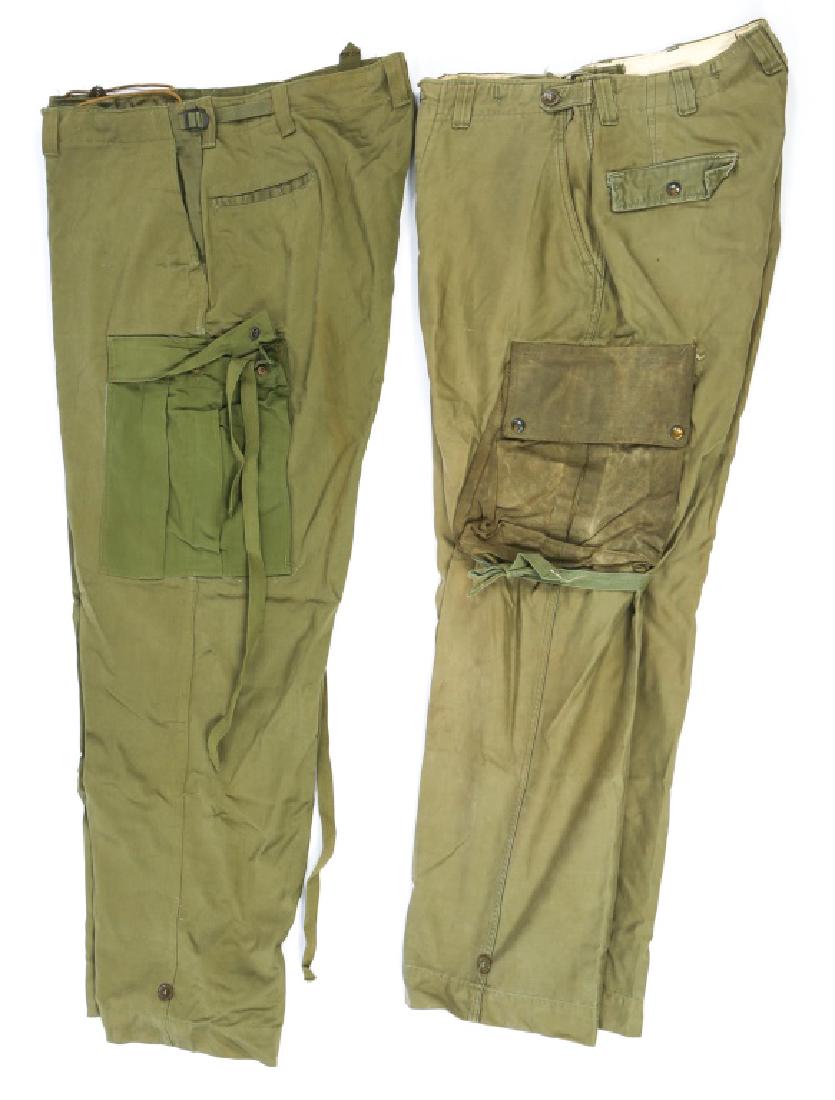 KOREAN WAR US ARMY PARATROOPER PANTS LOT OF 2: KOREAN WAR US ARMY PARATROOPER PANTS LOT OF 2 Korean War, M45 trousers with heavy canvas reinforced cargo pockets, size 34 x 30. M51 field trousers, size 46 x 32.