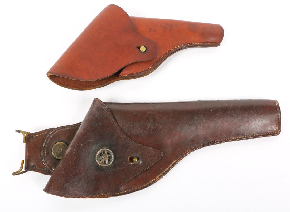 WWI US ARMY COLT REVOLVER LEATHER HOLSTER LOT: WWI US ARMY COLT REVOLVER LEATHER HOLSTER LOT WWI Colt / Smith & Wesson long barrel leather holster, swivel belt attachment , Corps of Transportation insignia, stamped " Rock Island Arsenal 1917 T.C.C