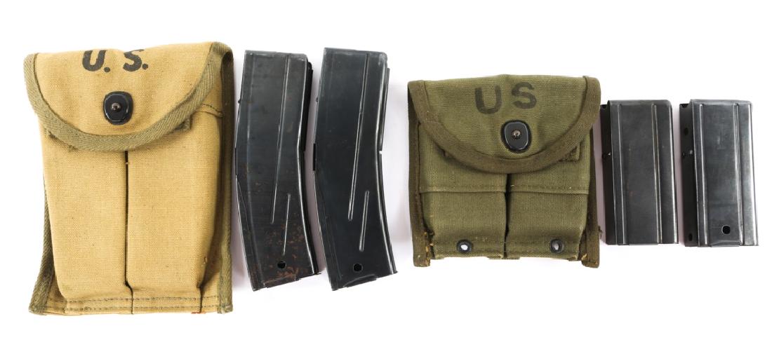WWII US M1 CARBINE MAGAZINE & MAGAZINE POUCH LOT: WWII US M1 CARBINE MAGAZINE & MAGAZINE POUCH LOT 1- US M1 carbine magazine pouch with two 15rd magazines. 1- US M1 carbine magazine pouch with two 30 round magazines.