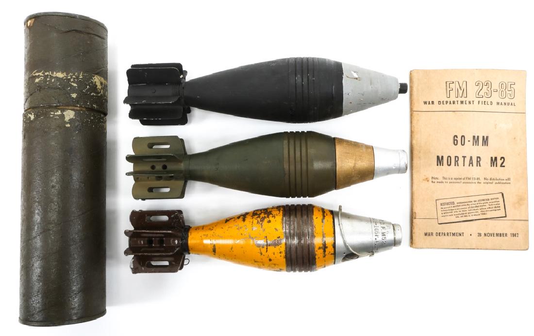 US ARMY M2 MORTAR 60MM ROUND LOT OF 3: US ARMY M2 MORTAR 60MM ROUND LOT OF 3 Lot of 3 inert 60mm mortar rounds. WWII M49A2 60mm M2 mortar round, yellow painted, aluminum fuse marked M52 and dated 6/42. M49A3 practice round dated 73. Wooden