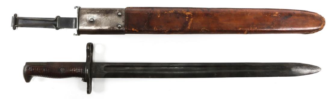 US M1905 SPRINGFIELD BAYONET WITH LEATHER SCABBARD: US M1905 SPRINGFIELD BAYONET WITH LEATHER SCABBARD M1905 Springfield bayonet, stamped RIA 1910 on the ricasso and US 170729 on the reverse. Leather scabbard stamped R.I.A 1906 H.E.K Blade Length: 16" 