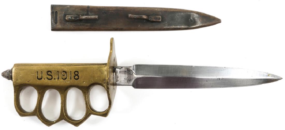 US MODEL 1918 MARK I TRENCH KNIFE BY AU LION: US MODEL 1918 MARK I TRENCH KNIFE BY AU LION French version of the US M1918 Mark I trench knife. Typical war time production with rough finish and unmarked steel scabbard. Ricasso stamped with a recum