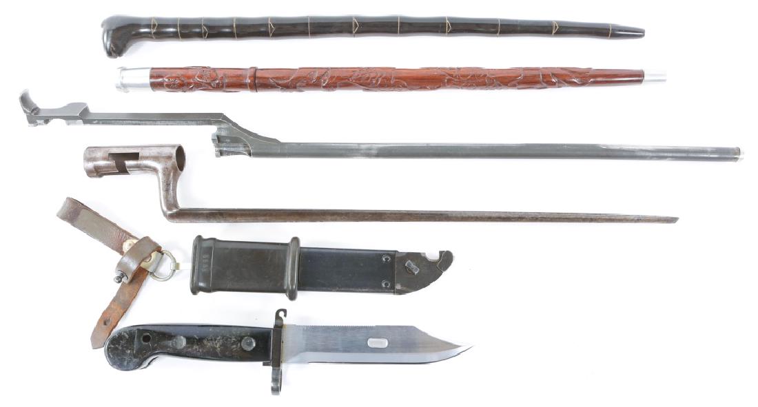 US BAYONET & SWAGGER STICK LOT OF 5: US BAYONET & SWAGGER STICK LOT OF 5 1- US M1816 socket bayonet. 1- Operating rod for M1 Garand (SN# D35382 SA). 2- Swagger sticks. One is constructed of horn to resemble a serpent, the other is wood w
