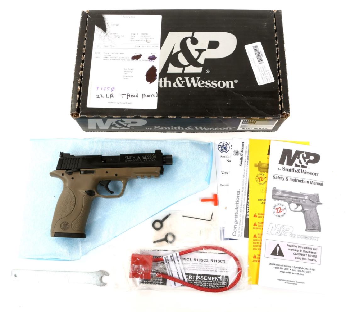 SMITH AND WESSON MP22C PISTOL FDE .22 CALIBER: SMITH AND WESSON MP22C PISTOL FDE .22 CALIBER FDE frame with suppressor ready threaded barrel. Model: MP22C Caliber / Gauge: .22 Barrel Length: 4" Serial Number: HHW7793