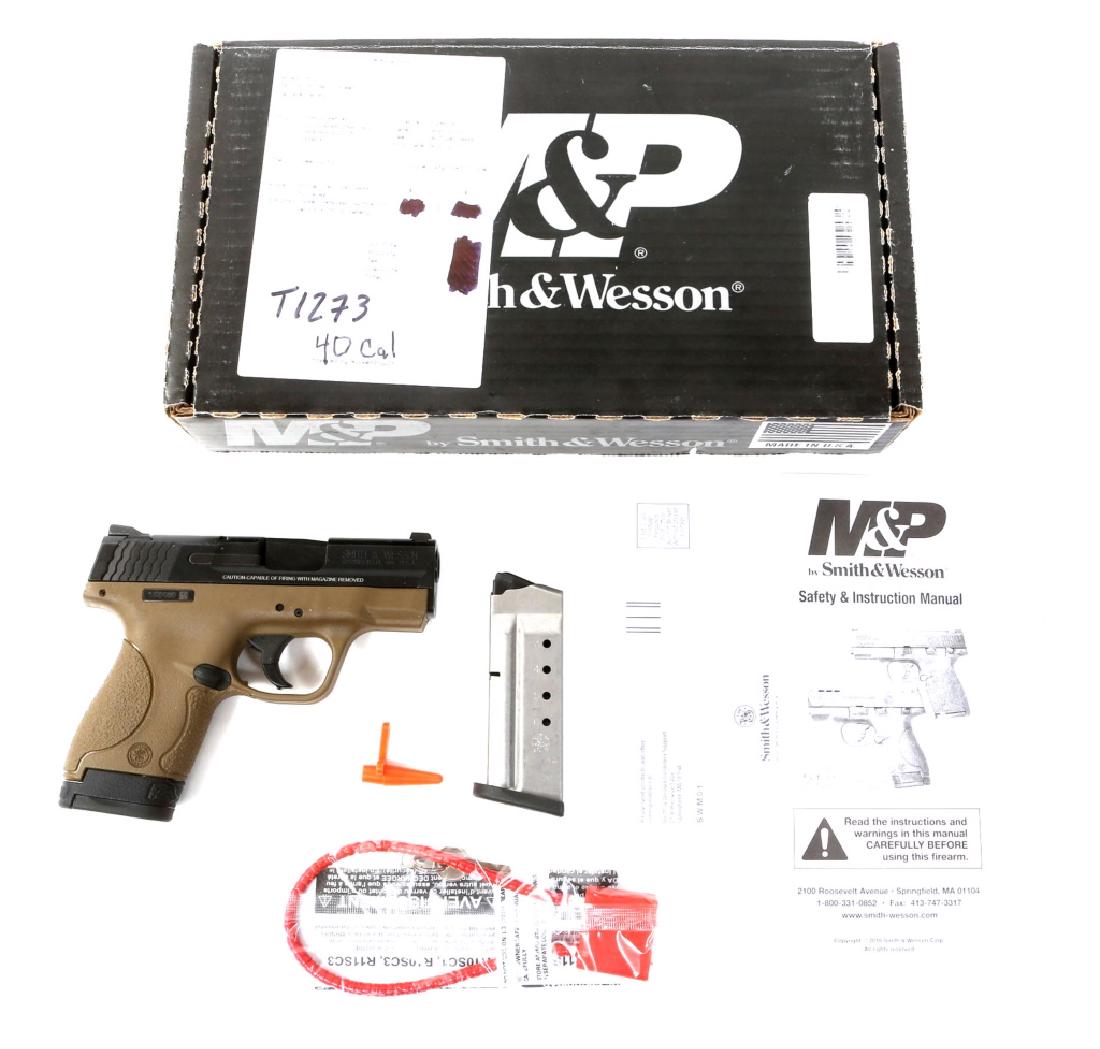 SMITH AND WESSON MP40 SHIELD PISTOL FDE: SMITH AND WESSON MP40 SHIELD PISTOL FDE Includes original box and accessories. FDE frame. Model: MP40 shield Caliber / Gauge: .40 Barrel Length: 3" Serial Number: HXM6168