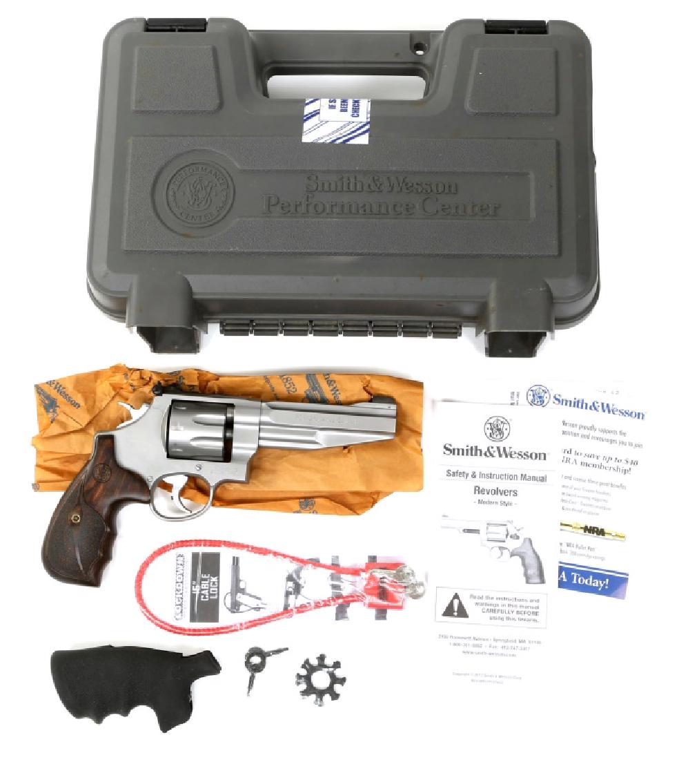 SMITH AND WESSON MODEL 627-5 REVOLVER .357 MAGNUM: SMITH AND WESSON MODEL 627-5 REVOLVER .357 MAGNUM Includes original box and accessories. Model: 627-5 Caliber / Gauge: .357 Barrel Length: 5" Serial Number: DJS6251