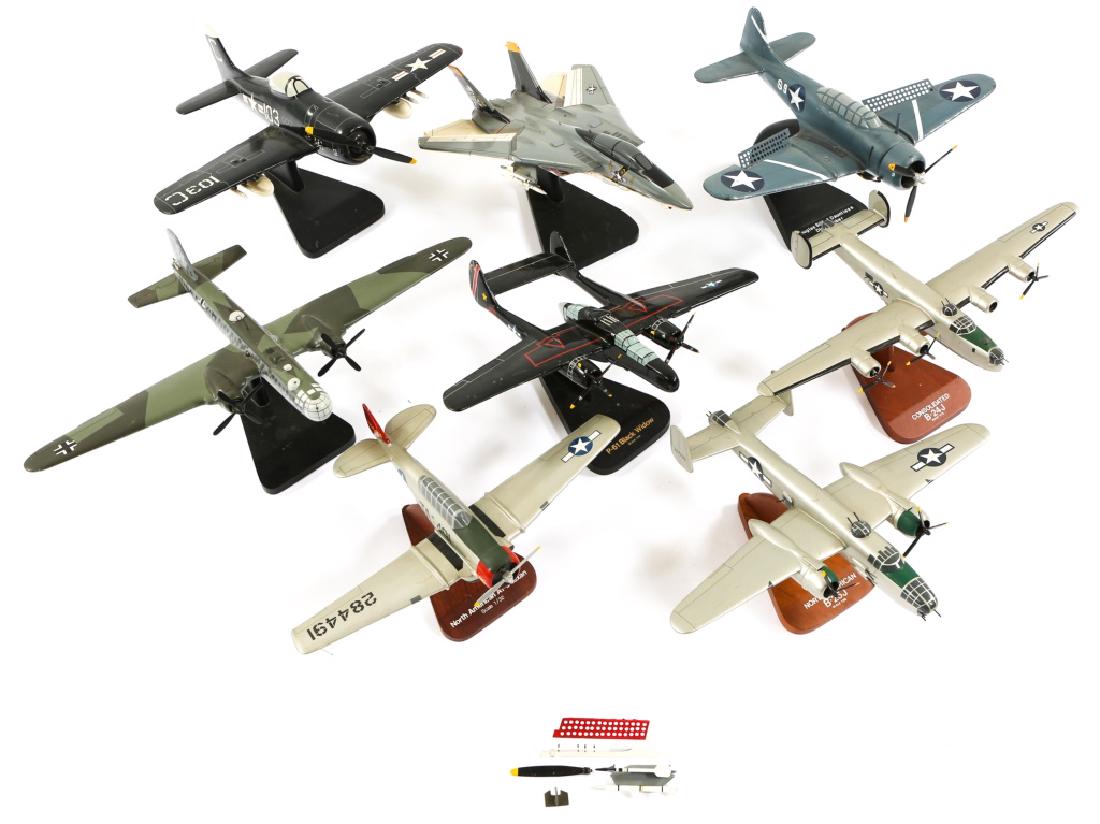 WORLD MAHOGANY WOODEN AIRCRAFT MODEL LOT OF 8: WORLD MAHOGANY WOODEN AIRCRAFT MODEL LOT OF 8 Wooden painted mahogany aircraft models. Size: 1:48