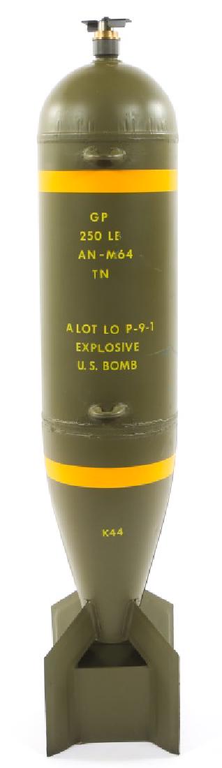 WWII US AN/M64 GP 250 LB INERT AERIAL ORDNANCE: WWII US AN/M64 GP 250 LB INERT AERIAL ORDNANCE WWII US AN/M64 general purpose 250 lb inert ordnance. Size: 43"X8"