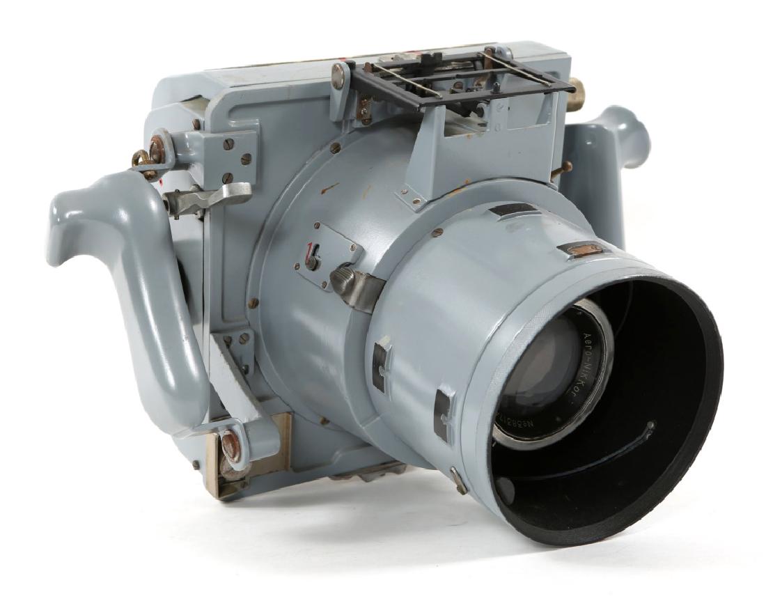 WWII ERA JAPANESE AIRCRAFT CAMERA: WWII ERA JAPANESE AIRCRAFT CAMERA Aerial camera with Nikon lens marked "No 38317412, 1:3.5, f=20cm, Aero-Nikkor. Size: 10" X13"