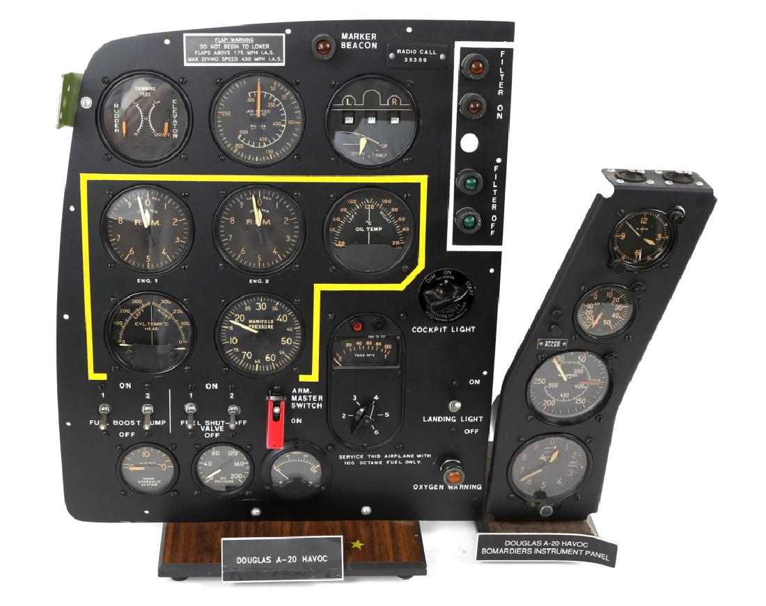 WWII DOUGLAS A-20 HAVOC AIRCRAFT INSTRUMENT PANELS: WWII DOUGLAS A-20 HAVOC AIRCRAFT INSTRUMENT PANELS Lot of two instrument panels with various gauges and indicators mounted on wooden display bases. Includes bombadiers panel and display model built by