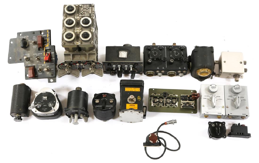 WWII ERA US AIRCRAFT CONTROLS & SWITCHES LOT: WWII ERA US AIRCRAFT CONTROLS & SWITCHES LOT Includes fuel selector valve for Martin B-26C Marauder, various turn controls, radio control box, lighting switches, magneto switch, ignition switches, jac