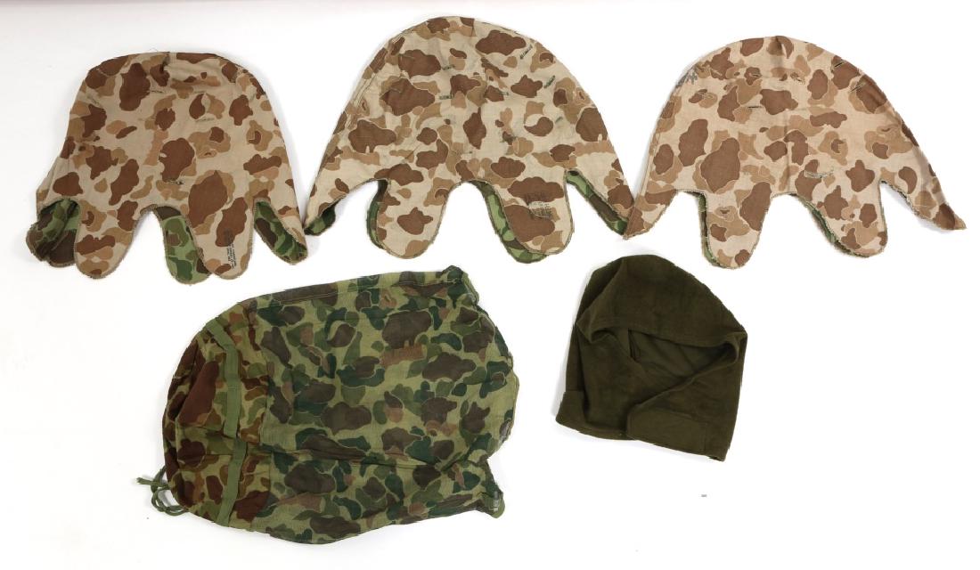 KOREAN WAR US TYPE 3 HELMET COVER LOT: KOREAN WAR US TYPE 3 HELMET COVER LOT Three type 3 helmet covers, one sleeping bag hood, one WWII mosquito net helmet cover.