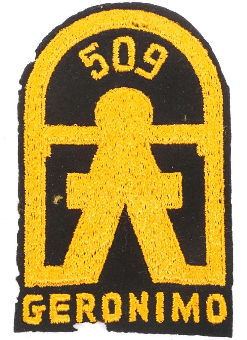 WWII AIRBORNE 509th PIR GERONIMO POCKET PATCH: WWII AIRBORNE 509th PIR GERONIMO POCKET PATCH WWII / Occupation, US Airborne 509th P.I.R pocket patch. Machine embroidered "waffle waves" on felt. No glow under UV light. Came out of a scrapbook. Size