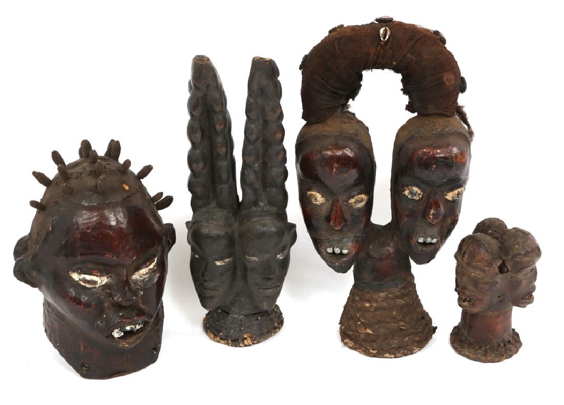 AFRICAN EKOI MASK AND FIGURE LOT: AFRICAN EKOI MASK AND FIGURE LOT Ekoi two headed figure decorated with carved shell crab claws, Ekoi figure with two heads with hide covering, and leather covered double faced Janus mask.