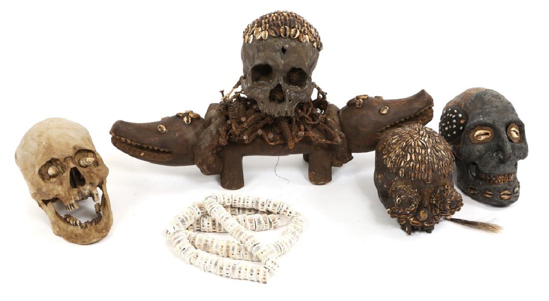 INDONESIAN ANCESTRAL & TROPHY SKULL MODEL LOT OF 4: INDONESIAN ANCESTRAL & TROPHY SKULL MODEL LOT OF 4 Resin models of decorated trophy and ancestral human skulls from various indigenous tribes of South Pacific islands. Most decorated with crab claws a