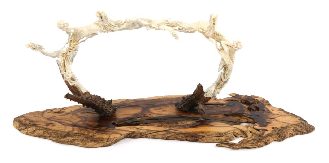 DRAGON CARVED ANTLER MODEL: DRAGON CARVED ANTLER MODEL Resin model with wood base Size: 29"X12"