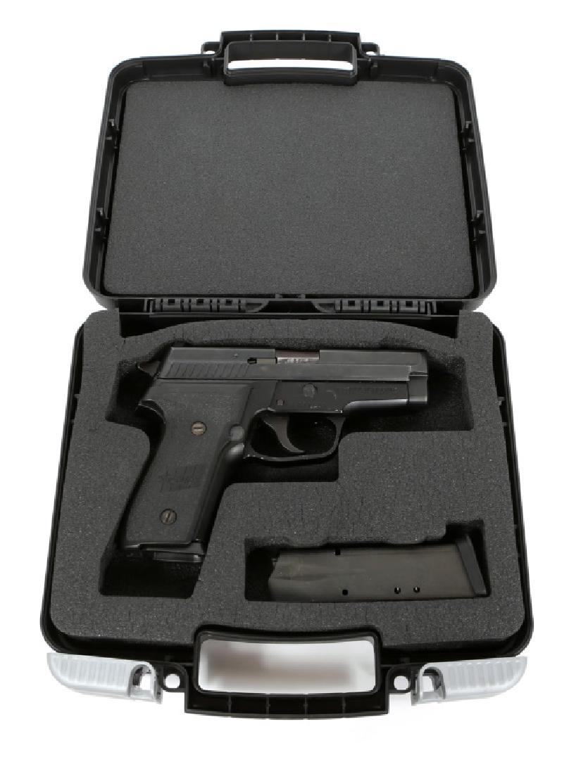 SIG SAUER MODEL P229 PISTOL .40 CALIBER: SIG SAUER MODEL P229 PISTOL .40 CALIBER In original case. Two magazines. Model: P229 Caliber / Gauge: .40 S&W Barrel Length: 4" Serial Number: AK11513