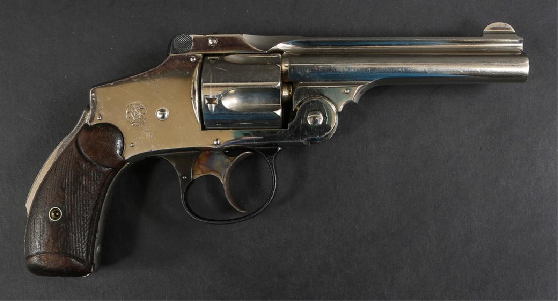S&W SAFETY HAMMERLESS 5TH MODEL .38 REVOLVER: S&W SAFETY HAMMERLESS 5TH MODEL .38 REVOLVER Matching serial numbers. Model: 5th Model Caliber / Gauge: .38 S&W Barrel Length: 4" Serial Number: 239230