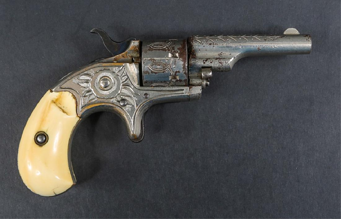 1874 COLT OPEN TOP POCKET MODEL .22 CAL REVOLVER: 1874 COLT OPEN TOP POCKET MODEL .22 CAL REVOLVER Bone grips. Model: Open Top Pocket Model Caliber / Gauge: .22 Barrel Length: 2.5" Serial Number: 32305