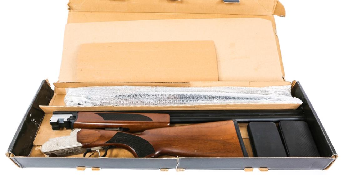 MOSSBERG MODEL SILVER RESERVE II SHOTGUN: MOSSBERG MODEL SILVER RESERVE II SHOTGUN Original box. 26" & 28" barrel. Choke sets. Imported by Mossberg International. Model: Silver Reserve II Caliber / Gauge: 12 / 20 GA Barrel Length: 28" Serial 