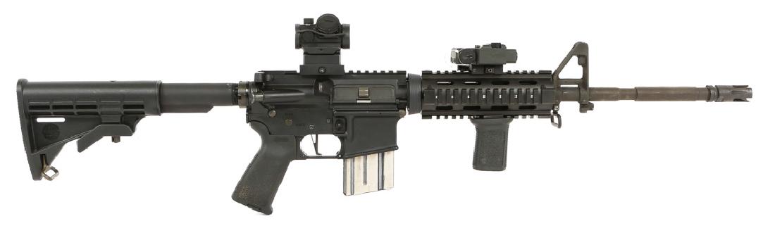 BUSHMASTER MODEL XM15-E2S CARBINE MULTI CALIBER: BUSHMASTER MODEL XM15-E2S CARBINE MULTI CALIBER Adjustable buttstock. Bushnell red-dot sight, VISM laser sight, BCM foregrip. Aftermarket trigger assembly, flat face trigger. Model: XM15-E2S Caliber /
