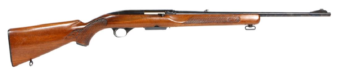 WINCHESTER MODEL 100 RIFLE .243 WINCHESTER CALIBER: WINCHESTER MODEL 100 RIFLE .243 WINCHESTER CALIBER Top drilled for scope. Model: 100 Caliber / Gauge: .243 WIN Barrel Length: 22" Serial Number: 107700