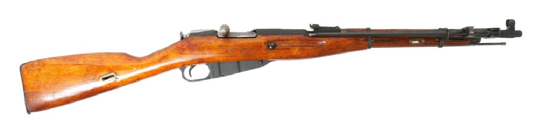 1945 IZHEVSK MODEL 44 MOSIN NAGANT RIFLE 7.62X54R: 1945 IZHEVSK MODEL 44 MOSIN NAGANT RIFLE 7.62X54R No import marking. Folding bayonet. Non-matching bolt serial number. Model: Mosin nagant Caliber / Gauge: 7.62x54R Barrel Length: 21" Serial Number: Q