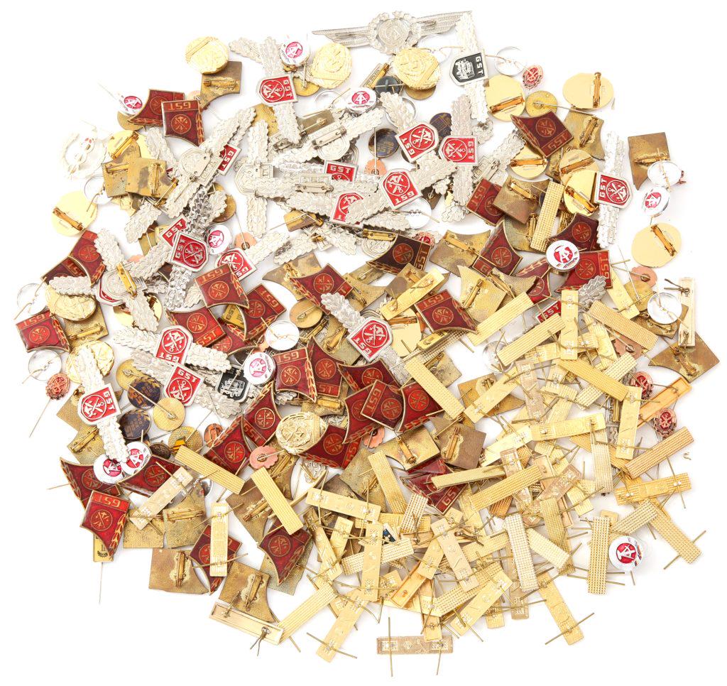 COLD WAR EAST GERMAN PIN & COCKADE LOT: COLD WAR EAST GERMAN PIN & COCKADE LOT GST pins, East German cockades, active work service pins.