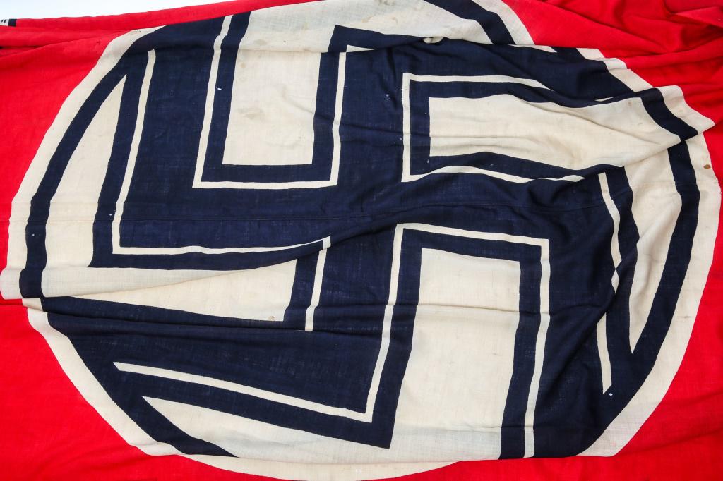 WWII GERMAN STATE SERVICE FLAG: WWII GERMAN STATE SERVICE FLAG German World War II State Service Flag. Measures 94” wide by 156” tall. Shows a swastika in the center with a German political eagle in the upper corner. Has the whi