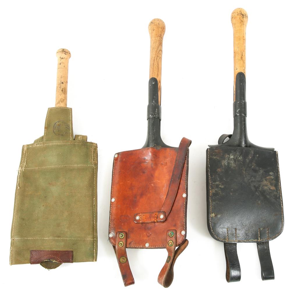 WWII WORLD MILITARY SHOVEL LOT OF 3: WWII WORLD MILITARY SHOVEL LOT OF 3 WWII Swiss Army shovel stamped: "LC40," German carry case stamped "cgu 1940" with waffenamt. WWII Soviet shovel, with green canvas carry case. WWII Swiss Army shove
